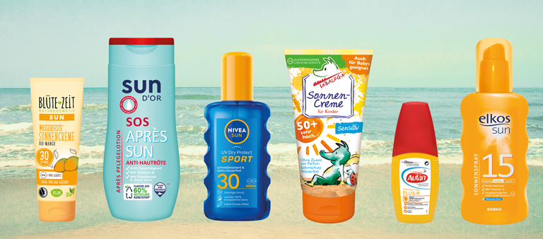 Sonnen- und Insektenschutz-Produkte vor Strandhintergrund